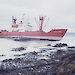 Nella Dan aground on jagged Macquarie Island rocks