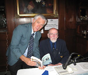 Phil Law and his book with Major Ian Toohill