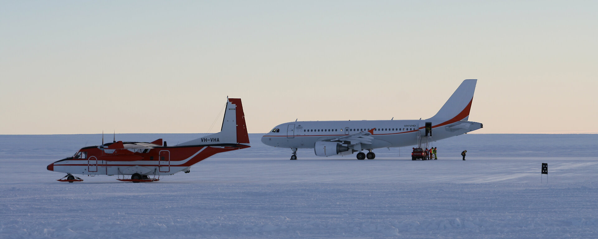 The Airbus A319 and C212 at Wilkins Runway in Antarctica