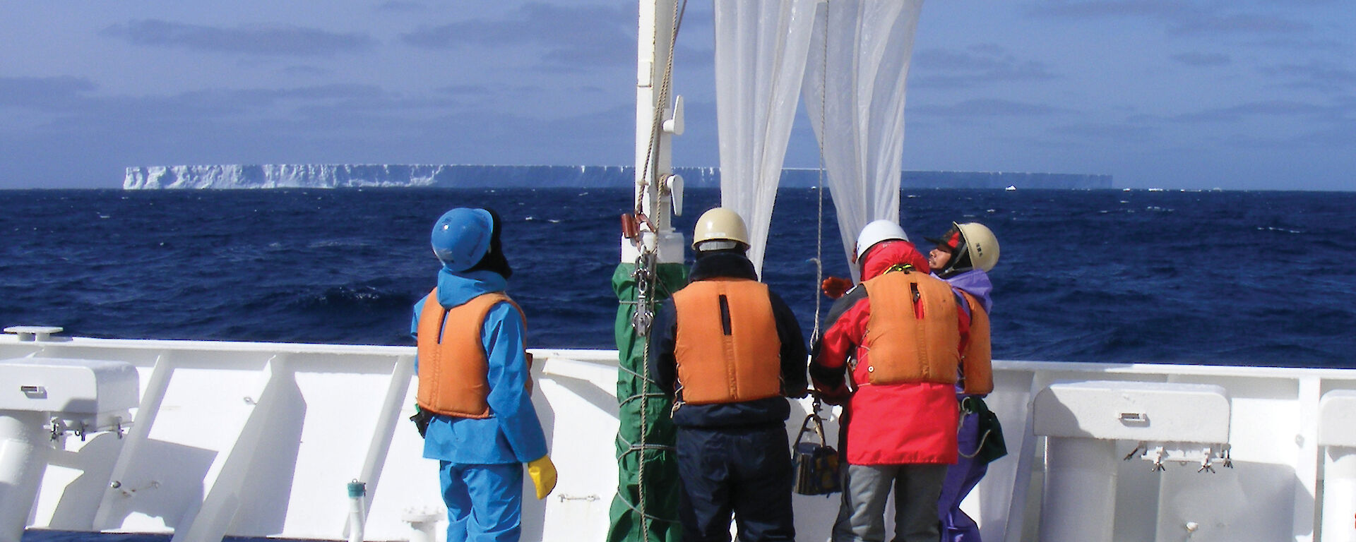 Workers with Norpac net, consisting of 330 micron and 110 micron nets side by side