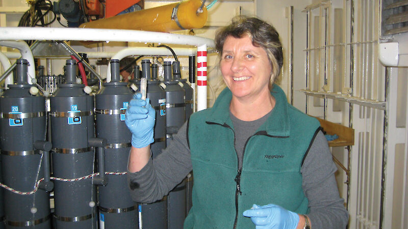 Margot Foster beside a Conductivity, Temperature, Depth recorder.