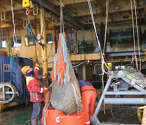A Marine Science Support gear officer with the French beam trawl during CEAMARC.