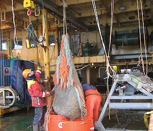 A Marine Science Support gear officer with the French beam trawl during CEAMARC