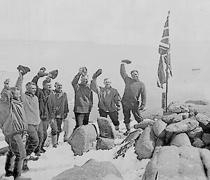 Early expeditioners with British flag in ground