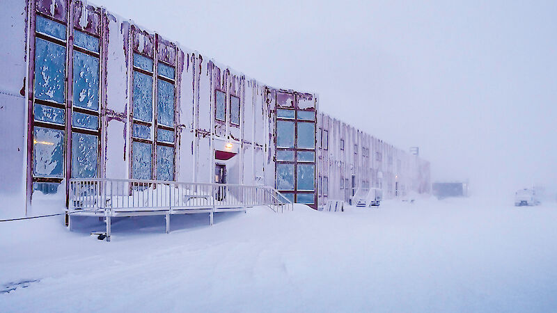 The Red Shed at Casey, covered in snow after a blizzard.