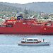 A re-enactment of the departure of the Aurora in 1911, as the modern-day icebreaker Aurora Australis heads for Antarctica on 2 December 2011, escorted down the Derwent River by a flotilla of yachts, ships and boats. Here the Governor General, onboard launch Egeria, takes the salute from Aurora Australis.