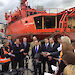 Federal Environment Minister, Greg Hunt, tells media about the new Australian icebreaker while standing in front of the Aurora Australis on the Hobart wharf
