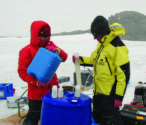 Rick Cavicchioli (left) and Torsten Thomas, both from UNSW, process microbial samples collected at Ace Lake – a source of cold-loving methanogens.