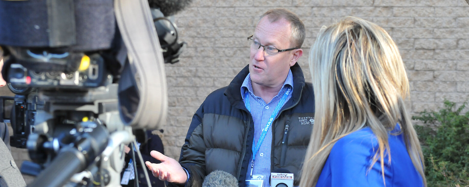 Professor Tim Naish in front of the media after his keynote presentation.