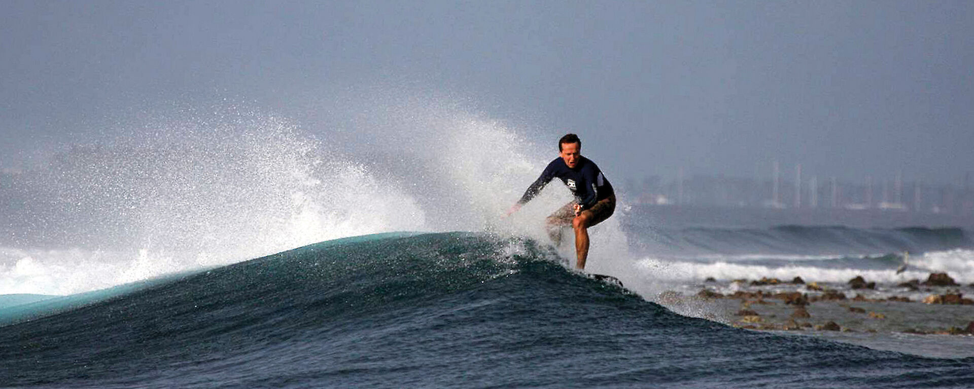 Nick surfing in the Maldives