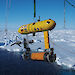 The Autonomous Underwater Vehicle (AUV) being lowered off the stern of the ship. The data from the AUV will be used to make 3-D maps of the underside of the sea ice.