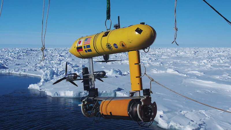 The Autonomous Underwater Vehicle (AUV) being lowered off the stern of the ship. The data from the AUV will be used to make 3-D maps of the underside of the sea ice.