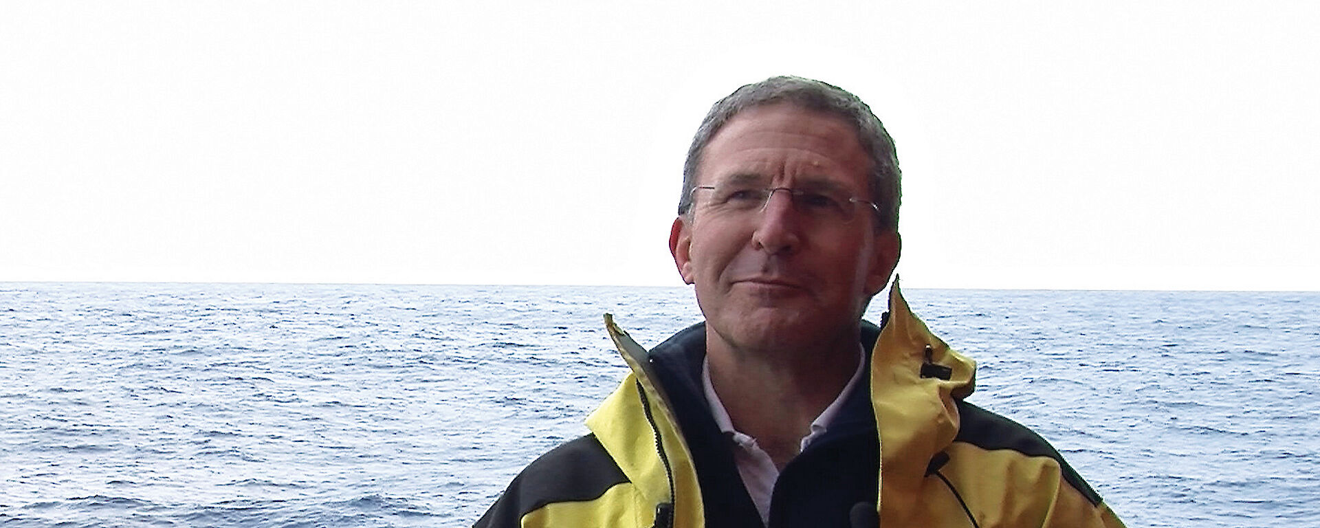 Picture of Dr Steve Rintoul on the Aurora Australis in the Southern Ocean.