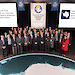 Antarctic Treaty consultative meeting Heads of Delegations gather in front of the giant floor map of Antarctica.