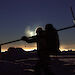 Scientist, Ernesto Trujillo-Gomez, carrying part of a radiometer mast back to the ship during SIPEX-II.