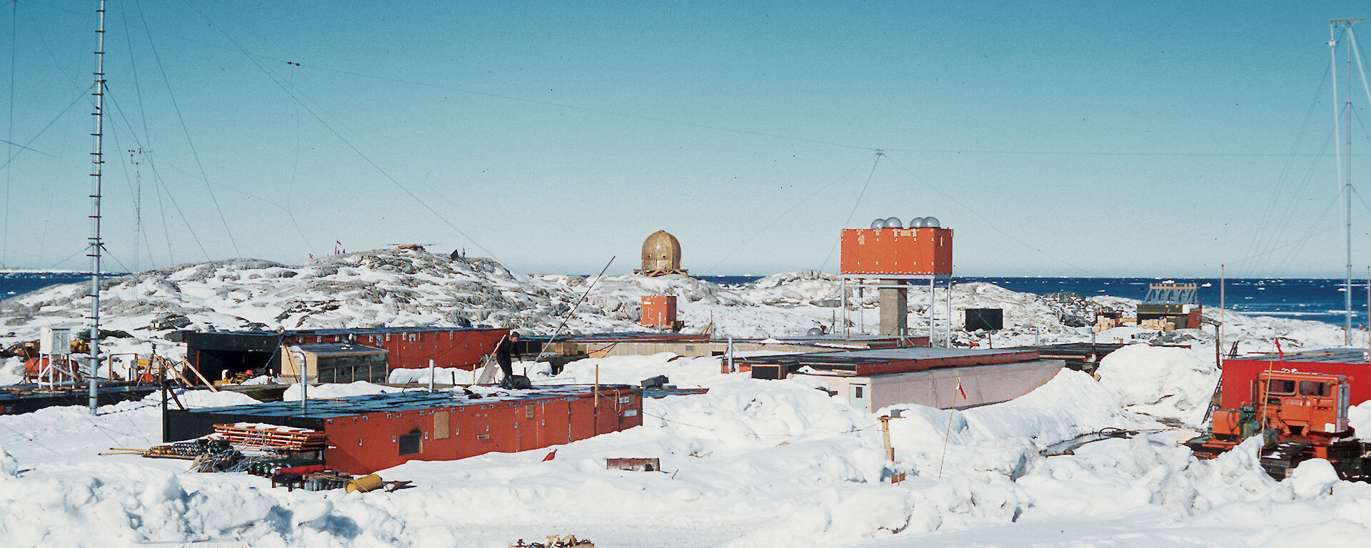 Wilkes station in 1961, gradually disappearing under ice