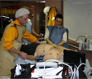 Casey doctor, Eve Merfield (right), prepares a patient for an X-ray (2005