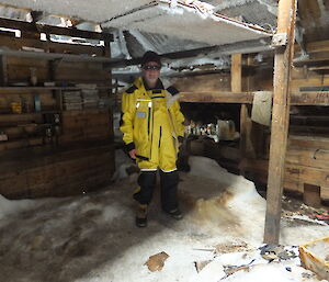 David Ellyard beside the wooden bunks inside Mawson’s Main Hut.