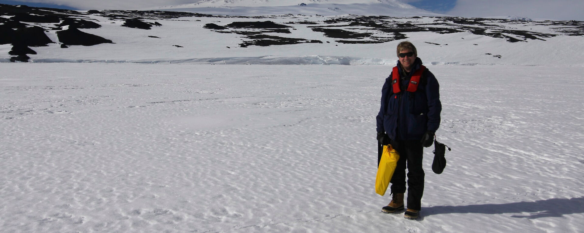 Dr Tony Fleming in front of Mt Erebus on Ross Island, during his trip to Antarctica earlier this year.