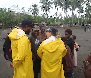 Dr Isabel Beasley and Olo Gebia (WWF Melanesia Program) discuss dolphin sightings with villagers who live near the Omati River in the Kikori Delta.