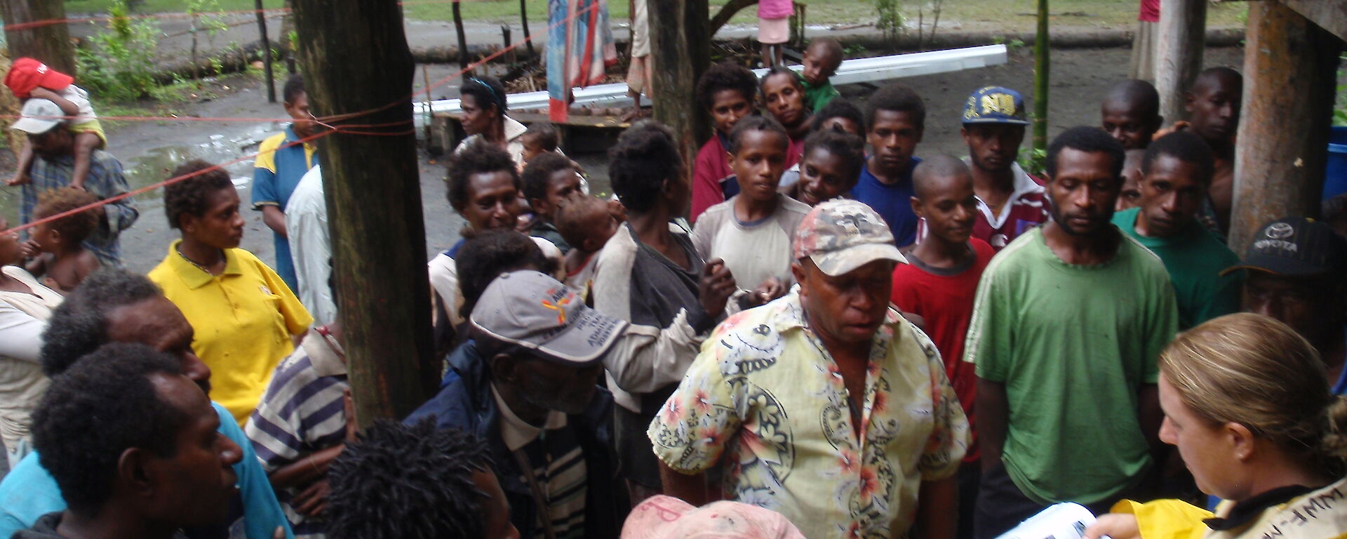 Dr Isabel Beasley conducts a small meeting at Veribari village in the Kikori Delta, to introduce the upcoming dolphin project and describe the dolphin species that occur in the delta.