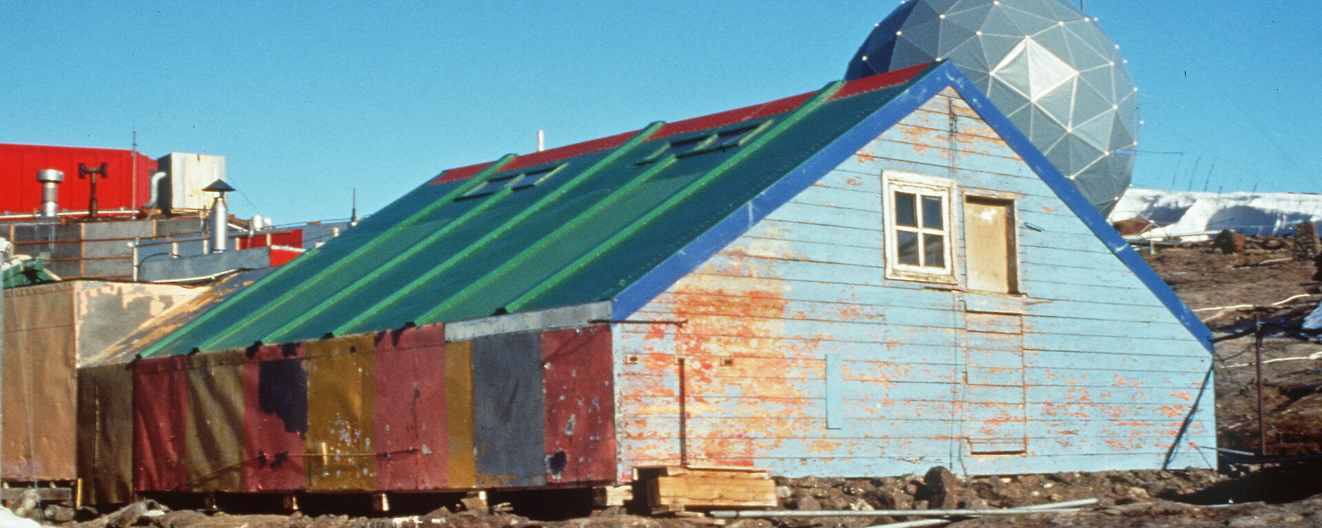 The weathered and colourful hut exterior in 1997.