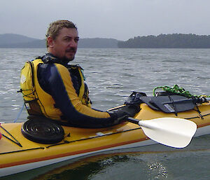 Casey Station Leader, Mark Hunt, paddling in a one man kayak