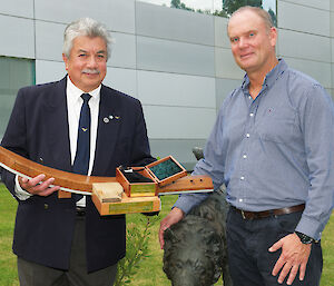 Gordon Bain (left) and 2011 Mawson Station Leader Mark Williams, with Misty’s plaque and ashes.