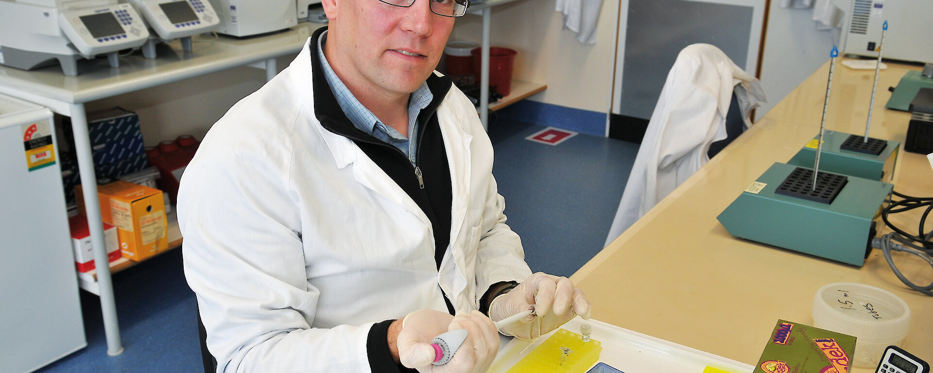 The first R J L Hawke Post Doctoral Fellow, Dr Bruce Deagle, in his lab at the Australian Antarctic Division.