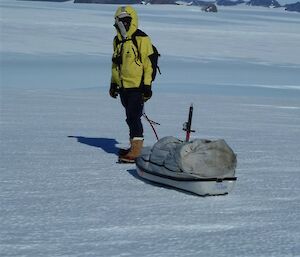 Expeditioner pulling a ‘pulk’ — a type of sled