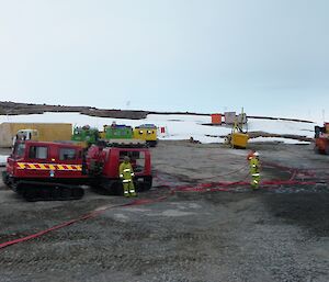 Fire Hägglunds with hoses run out