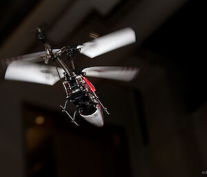 The radio controlled model helicopter in flight
