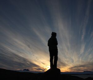 Susan silhouetted against the late evening sky