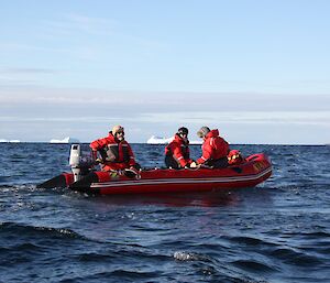 Expeditioners Lloyd, Rodney and Susan aboard an IRB