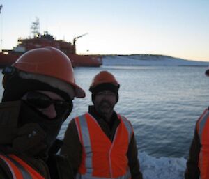 Anti-meteorite protection — 3 men wearing hard hats