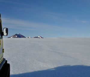 View alongside yellow hagglunds towards Mt. henderson