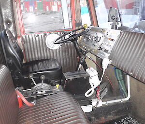 Drivers cabin of the Pioneer showing its dated controls.
