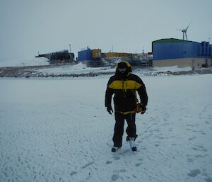 Expeditioner ice skating on the sea ice in Horseshoe Harbour