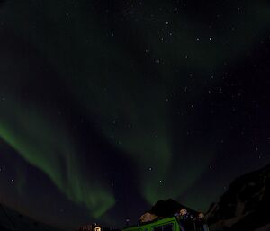 Green aurora in sky at night over Hägglunds