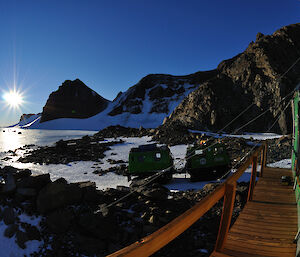 Fisheye photo of Northern Masson Range with green Hägglunds and Rumdoodle hut in foreground