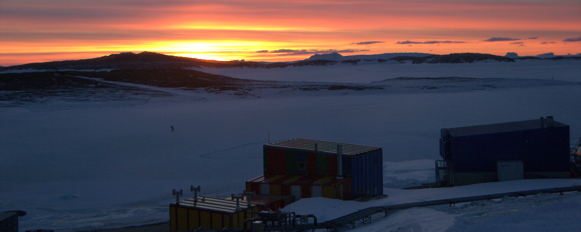 Lone skater on Horseshoe Harbour at sunset