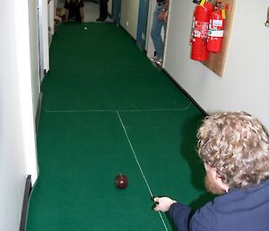 A young expeditioner playing carept bowls