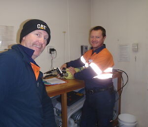 An electrician and plumber certifying the air quality in the breathing apparatus cylinders