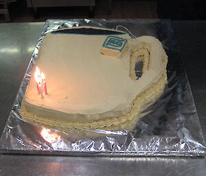 An expeditioner’s large birthday cake made in the shape of a large tea cup