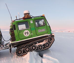 Vehicle crossing a snow bank