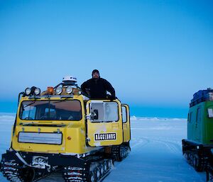 Chris, the Mawson carpenter leaning out of an Hägglunds