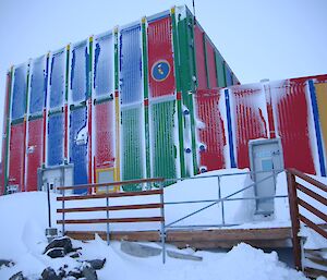 The carpenter’s workshop is also called the Rosella Building as its panels are multicoloured as is the Crimson Rosella. Snow is built up on the downwind side of the building