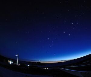 A pre-dawn photo with the station in the foreground and Jupiter rising just about Welch Island (conical shaped)and a rising Orion slightly higher in the sky