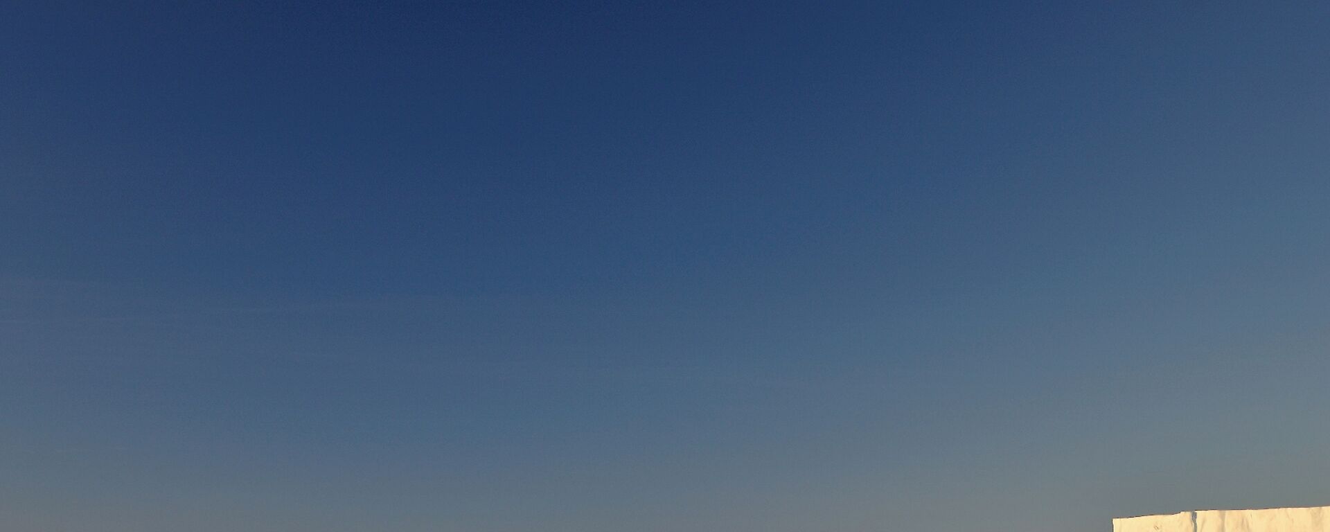 The auster emperor penguin colony last week with the massive icebergs and the plateau in the distance