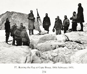 Hurley’s photo of Mawson and his ten men at Cape Bruce on the 18th February 1931, copied from page 234 of ‘B.A.N.Z. Antarctic Research Expedition 1929–1931, Reports — Series A, Volume 1, Geographical Report', based on the ‘Mawson Papers’ by A Grenfell Price, Adelaide 1963.